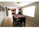 Comfortable dining area that flows into the kitchen, complete with tile flooring at 904 Crestwood Ln, Altamonte Springs, FL 32701