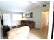 A comfortable living room featuring neutral walls and ceramic tile flooring at 904 Crestwood Ln, Altamonte Springs, FL 32701