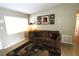 An airy living room featuring neutral walls and ceramic tile flooring at 904 Crestwood Ln, Altamonte Springs, FL 32701
