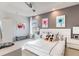 Bright bedroom featuring modern decor, a comfortable bed, and stylish, minimalist furniture at 3881 Sonoma Blvd, Kissimmee, FL 34741