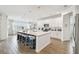 Beautiful kitchen with a large island, ample counter space, and modern appliances at 3881 Sonoma Blvd, Kissimmee, FL 34741