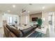Elegant living room showcasing contemporary decor, open floor plan, and abundant natural light at 3881 Sonoma Blvd, Kissimmee, FL 34741