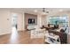 Comfortable living room with modern furniture, large windows and access to the outdoor spaces at 3881 Sonoma Blvd, Kissimmee, FL 34741