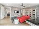 Another view of the game room with open concept layout, and a pool table with modern decor at 3881 Sonoma Blvd, Kissimmee, FL 34741