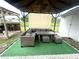 Relaxing patio area under a gazebo with seating, great for outdoor entertaining and dining at 1018 Martin Blvd, Orlando, FL 32825