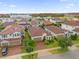 An aerial view captures the home's roof, landscaping, and location within a community at 10257 Henbury St, Orlando, FL 32832