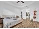 Spacious bedroom with ensuite bath and large closet, features light wood flooring and bright, natural light at 10257 Henbury St, Orlando, FL 32832