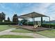 Well-shaded neighborhood playground offering a variety of slides and climbing structures at 10257 Henbury St, Orlando, FL 32832