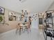 Inviting dining area with pendant lighting, mirror feature and tile floors at 1174 Villa Ln # 115, Apopka, FL 32712