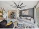 Open living space featuring modern décor, comfortable seating, and an artistic wall at 1174 Villa Ln # 115, Apopka, FL 32712