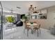 Relaxing living space with gray couches and modern décor, flowing to an outdoor patio at 1174 Villa Ln # 115, Apopka, FL 32712