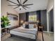 Main bedroom showcasing sleek design, including a modern ceiling fan, and natural light at 1174 Villa Ln # 115, Apopka, FL 32712