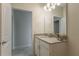 Bright bathroom features a single sink vanity and lots of counter space at 11810 Imaginary Way, Orlando, FL 32832