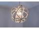 Elegant orb chandelier with crystal embellishments and silver finish at 11810 Imaginary Way, Orlando, FL 32832