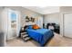 Bedroom with large window letting in natural light and workstation at 11980 Sands Cv, Orlando, FL 32828