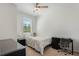 Bedroom with ceiling fan and neutral paint at 11980 Sands Cv, Orlando, FL 32828