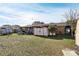 Spacious backyard with storage shed, covered patio, and ample room for outdoor enjoyment at 14884 Sw 35Th Cir, Ocala, FL 34473