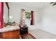 Bedroom featuring a dresser, tile flooring, and patterned curtains at 14884 Sw 35Th Cir, Ocala, FL 34473