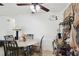 Bright dining area with a round table set for four and a coffee station at 14884 Sw 35Th Cir, Ocala, FL 34473