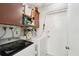 Laundry room with washer, dryer, and storage cabinets at 14884 Sw 35Th Cir, Ocala, FL 34473