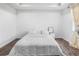 Bright bedroom featuring a cozy bed and neutral decor at 17087 Wynford Ln, Winter Garden, FL 34787