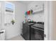 Laundry room with new washer and dryer at 17087 Wynford Ln, Winter Garden, FL 34787