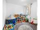 room with a tent and toys at 17087 Wynford Ln, Winter Garden, FL 34787