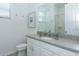 Clean bathroom featuring a vanity with modern fixtures, providing a serene and functional space at 2145 Fleming Mist Pl, Kissimmee, FL 34747