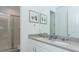 Bathroom with double vanity, shower and contemporary fixtures at 2145 Fleming Mist Pl, Kissimmee, FL 34747