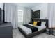 Modern bedroom featuring stylish furnishings, sleek decor, and lots of natural light at 2145 Fleming Mist Pl, Kissimmee, FL 34747
