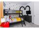 Bedroom featuring bunk beds and a Mickey Mouse themed decor at 2145 Fleming Mist Pl, Kissimmee, FL 34747