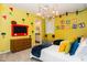 Bright bedroom with 'Toy Story' theme, featuring twin beds, colorful decor, and playful design elements at 2145 Fleming Mist Pl, Kissimmee, FL 34747