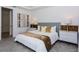 Comfortable bedroom featuring plush bedding, stylish decor, and ample natural light at 2145 Fleming Mist Pl, Kissimmee, FL 34747