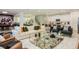 Spacious living area combining modern decor, comfortable seating, and an open layout for entertaining at 2145 Fleming Mist Pl, Kissimmee, FL 34747