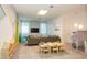 Spacious Gathering room with comfortable seating and entertainment area, perfect for relaxing and playtime at 2145 Fleming Mist Pl, Kissimmee, FL 34747