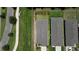 Top-down aerial view of homes, showcasing rooflines, landscaping, and street layout in neighborhood at 2271 Delhi Pl, Sanford, FL 32771