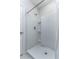 Modern shower stall with integrated shelving and sleek hardware inside the bathroom at 2271 Delhi Pl, Sanford, FL 32771