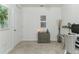 Neutral bedroom featuring a ceiling fan, window and furnished desk with natural lighting at 2271 Delhi Pl, Sanford, FL 32771