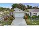 Charming single-story home with a well-manicured lawn and a two-car garage at 2271 Delhi Pl, Sanford, FL 32771