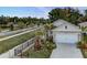Charming single-Gathering home featuring a well-manicured lawn and landscaping, a two-car garage, and a spacious driveway at 2271 Delhi Pl, Sanford, FL 32771