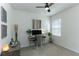 This home office features modern desk, chair and decor plus lots of natural light at 2271 Delhi Pl, Sanford, FL 32771