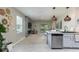 Open-concept living room features modern fireplace, a television, and seamless flow to outdoor area at 2271 Delhi Pl, Sanford, FL 32771