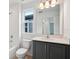 Stylish bathroom features granite counters, modern fixtures, and a well-lit mirror offering a functional space at 2354 Broadbrook Dr, St Cloud, FL 34771
