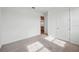 Bright bedroom features neutral carpet and white walls that create a serene and inviting atmosphere at 2354 Broadbrook Dr, St Cloud, FL 34771