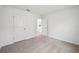 Inviting bedroom showcasing neutral carpet, white trim, and simple decor that offers comfort at 2354 Broadbrook Dr, St Cloud, FL 34771