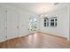Dining room featuring hardwood floors, white trim, a chandelier, and natural light at 2354 Broadbrook Dr, St Cloud, FL 34771