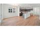 Open floor plan kitchen with an island, stainless steel appliances and hardwood floors at 2354 Broadbrook Dr, St Cloud, FL 34771