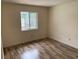 Bright bedroom with laminate flooring and natural light at 236 Bay Head Dr, Kissimmee, FL 34743