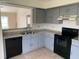 A beautifully remodeled kitchen featuring a black oven and plenty of cabinet space at 236 Bay Head Dr, Kissimmee, FL 34743