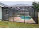 Enjoy outdoor living at its finest with this screened pool, accessible from multiple points in the home at 236 Bay Head Dr, Kissimmee, FL 34743